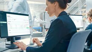 Person working at computer desk