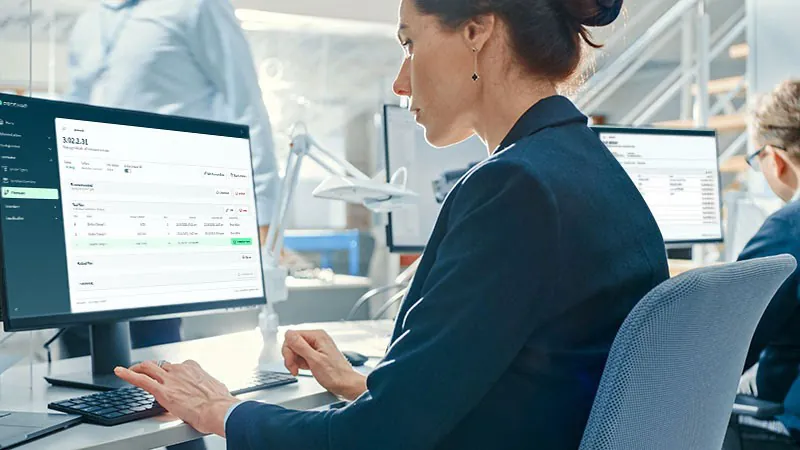 Person working at computer desk